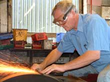 Tony Iles grinding a tuning gouge - 2004