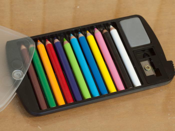 Portable Mini-Pencil Set with Sharpener and Eraser - 12 colors, 1 sharpener, 1 eraser, in a folding fitted case.
