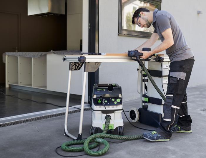 Festool MW 1000 Mobile MFT Work Shop - The MW 1000 table in use. Tools and vacuum not included. And the stock picture is way too clean to be an actual jobsite.